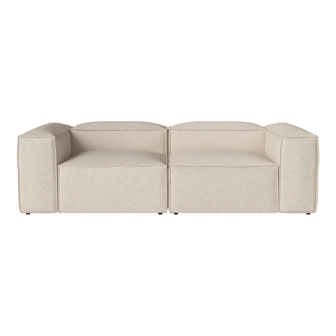 Beige contemporary sofa with minimalist design and smooth texture, featuring clean lines and a modern aesthetic.