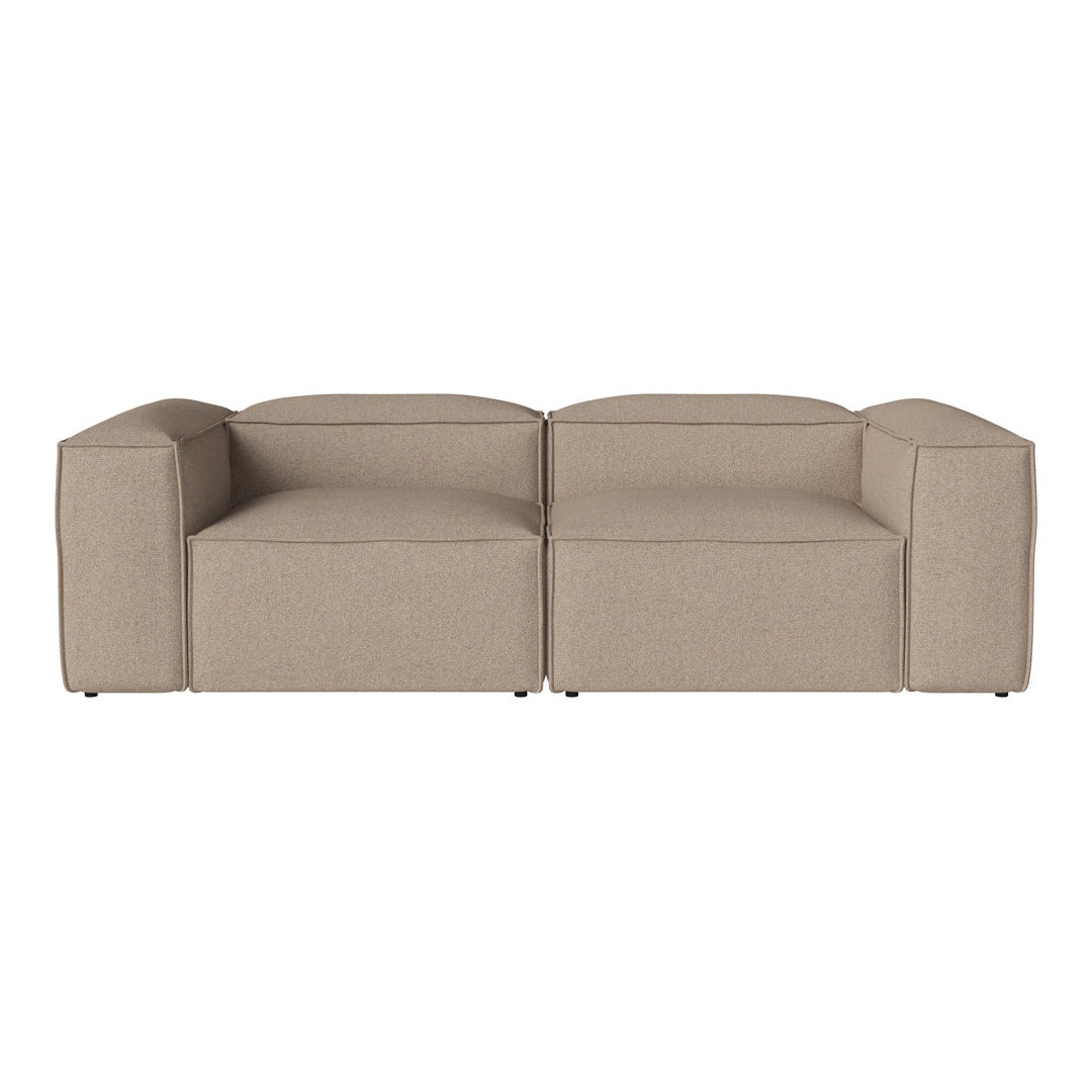 Beige modular sofa with sleek design, featuring a textured fabric and minimalistic, modern aesthetic.