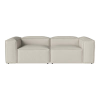 Light beige modern sectional sofa with a sleek, minimalist design and smooth fabric texture. Ideal for contemporary decor.
