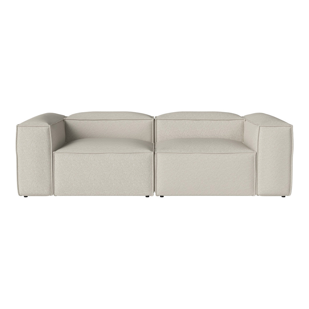Light beige modern sectional sofa with a sleek, minimalist design and smooth fabric texture. Ideal for contemporary decor.