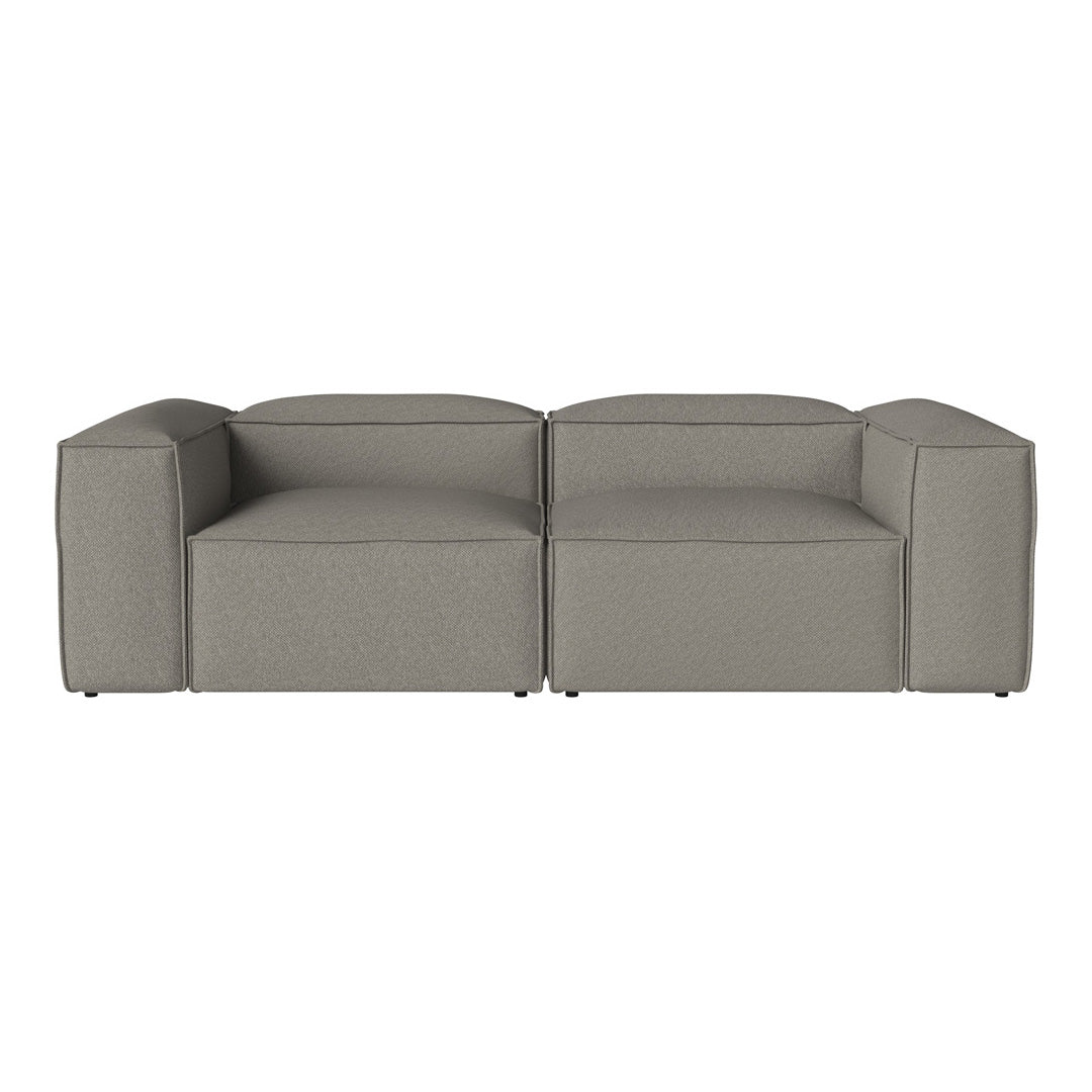 Gray modular sofa with clean lines and a minimalist design, featuring a smooth, textured fabric pattern.