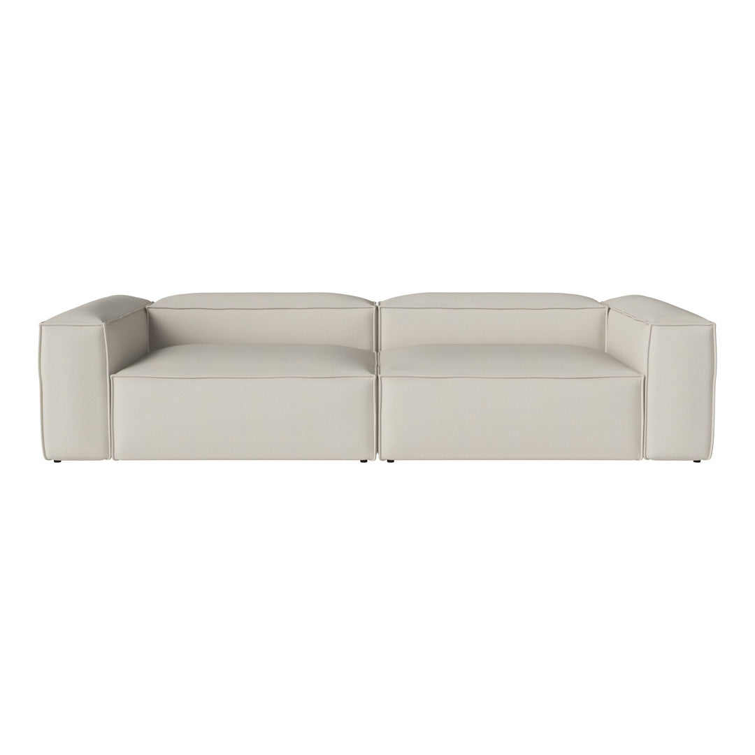 Modern beige sectional sofa with minimalist design and smooth, straight lines. Perfect for contemporary decor.