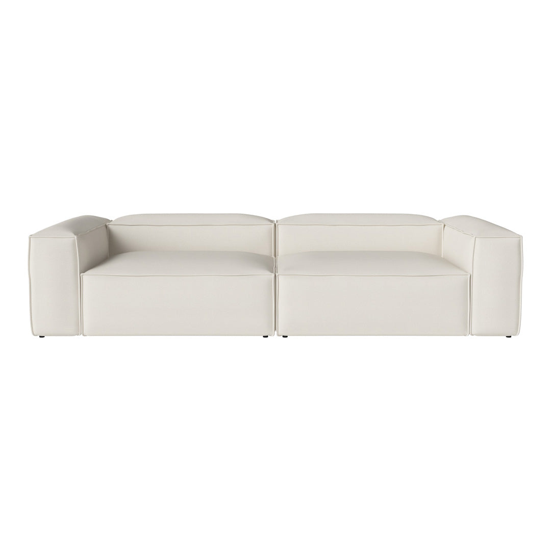 Modern white sectional sofa with a smooth, minimalist design, featuring clean lines and no visible patterns.