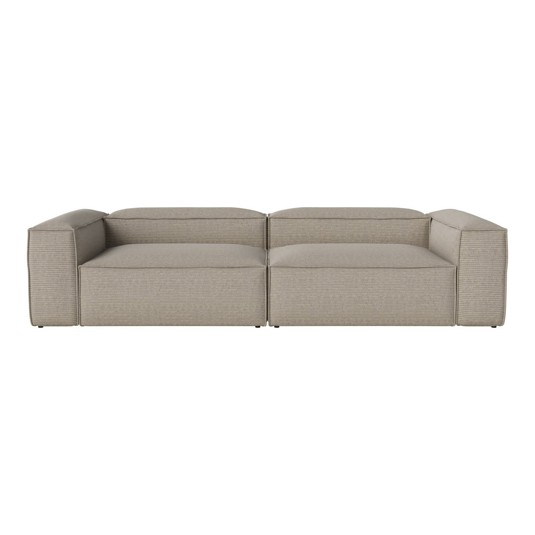 Beige sectional sofa with a minimalist, modern design and clean lines, ideal for contemporary living spaces.