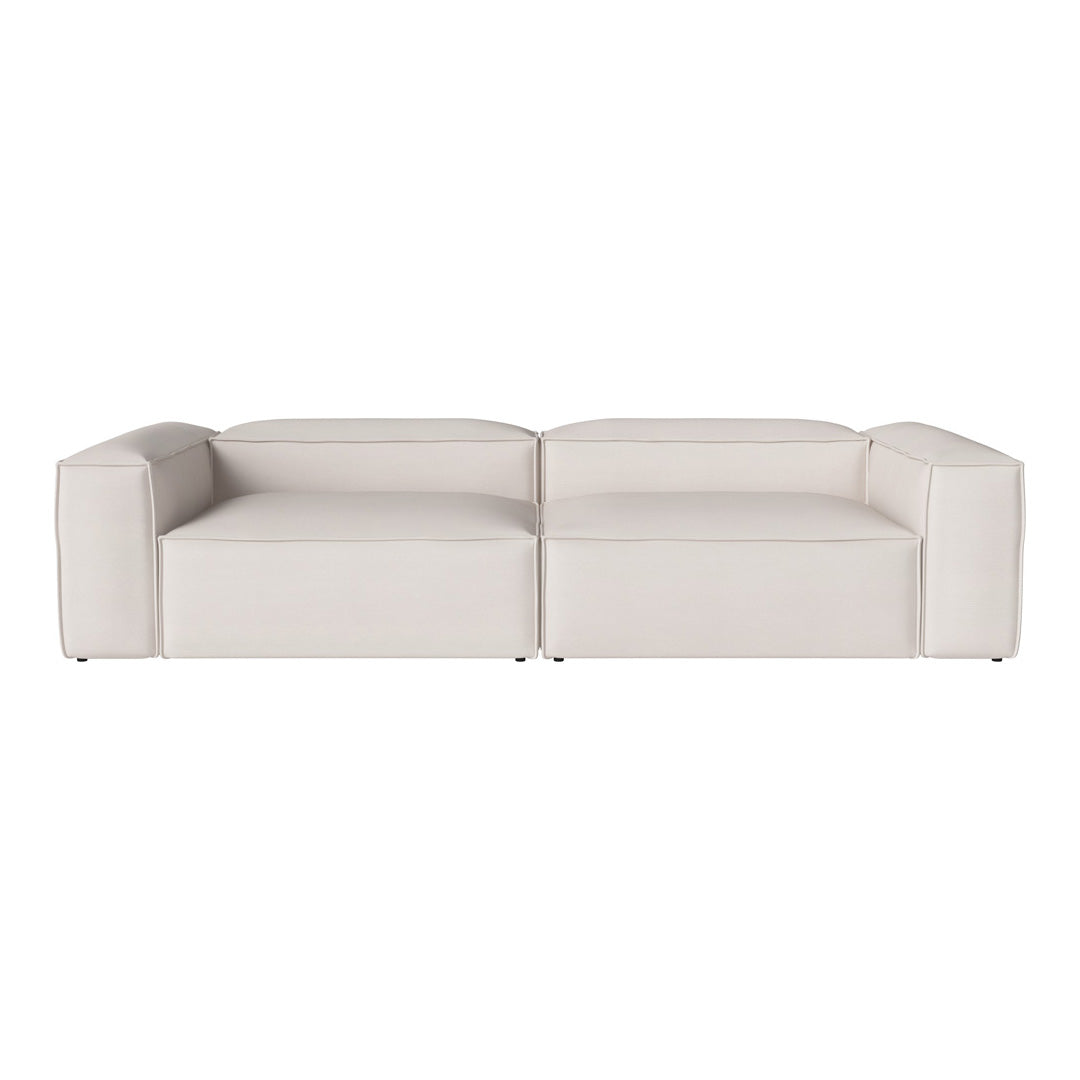 Modern white sectional sofa with clean lines and a minimalist design. Perfect for contemporary living spaces.
