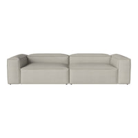Minimalist light gray sectional sofa with a smooth, seamless design, perfect for modern living spaces.