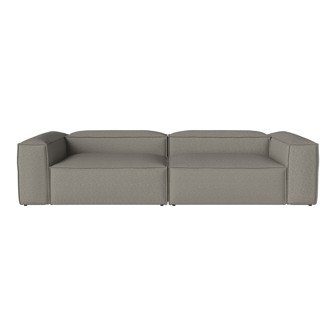 Modern gray sectional sofa with a smooth, solid fabric design. Stylish and versatile for various decor styles.