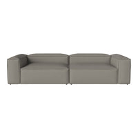Modern gray sectional sofa with a smooth, solid fabric design. Stylish and versatile for various decor styles.