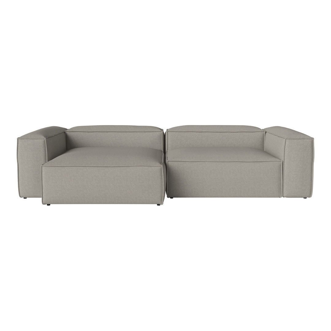 Gray modular sofa with clean lines and a textured fabric pattern for contemporary decor.