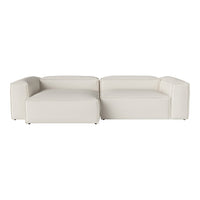 Modern white sectional couch with sleek lines and minimalistic design, perfect for a contemporary living space.