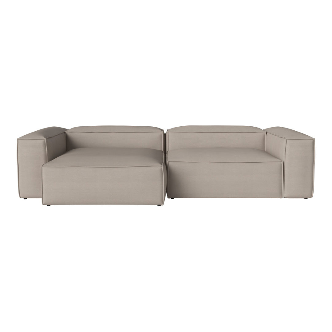 Light gray modular sofa with a sleek, contemporary design and smooth, textured fabric. Ideal for modern living spaces.