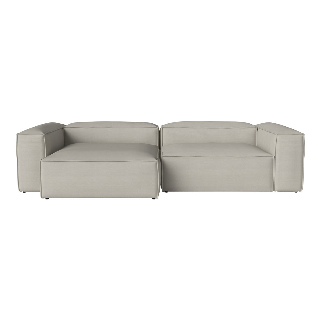 Light grey modular sectional sofa with sleek, minimalist design and smooth texture, perfect for modern decor.