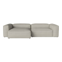 Light grey modular sectional sofa with sleek, minimalist design and smooth texture, perfect for modern decor.