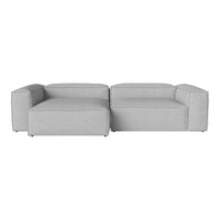 Gray sectional sofa with a smooth, modern fabric design and minimalist structure. Ideal for contemporary interiors.