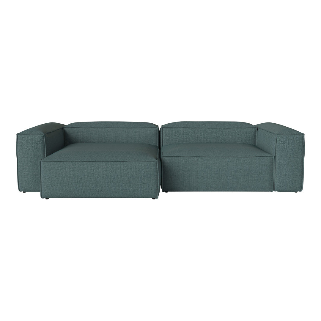 Teal sectional sofa with a modern, minimalist design and textured fabric finish, perfect for contemporary living spaces.