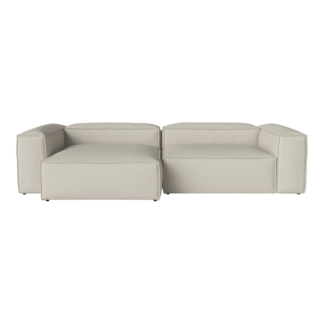 Light grey sectional sofa with a modern, minimalist design and smooth, clean lines. Ideal for contemporary interiors.