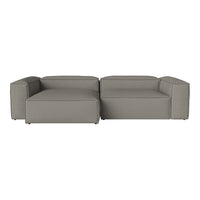Modern gray sectional sofa with sleek lines and a minimalist design, perfect for contemporary living spaces.
