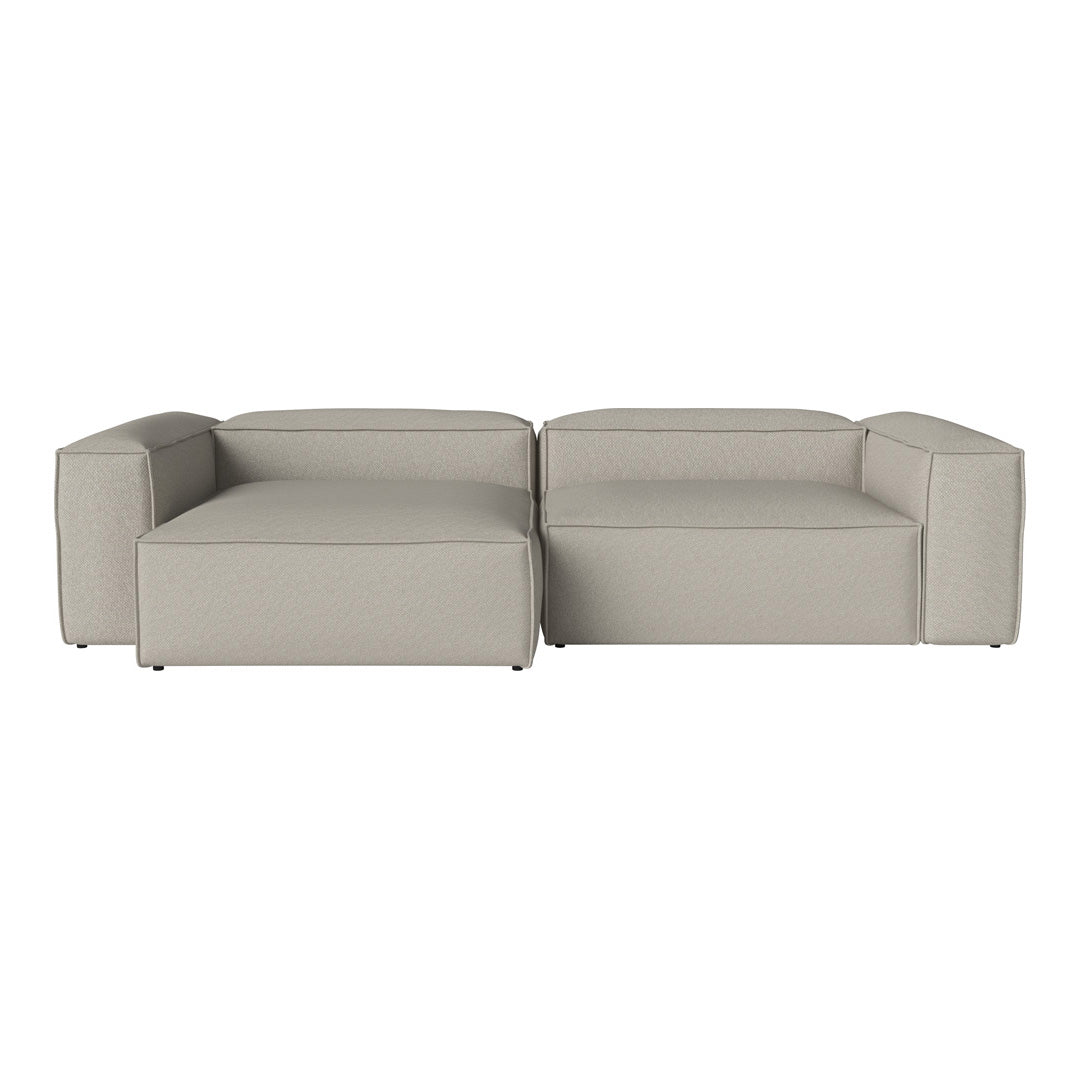Modern two-tone gray sectional sofa with minimalist design and smooth, clean lines. Perfect for contemporary spaces.