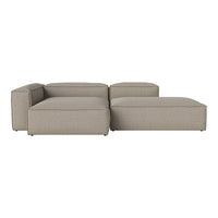 Beige sectional sofa with a sleek, modern design and subtle textured fabric pattern. Ideal for contemporary spaces.