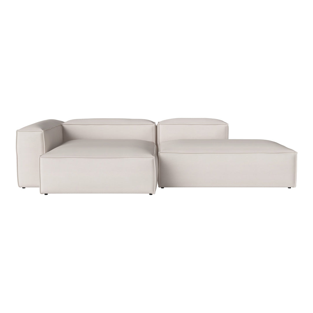 Light beige sectional sofa with a modern, minimalistic design and smooth texture. Perfect for contemporary spaces.