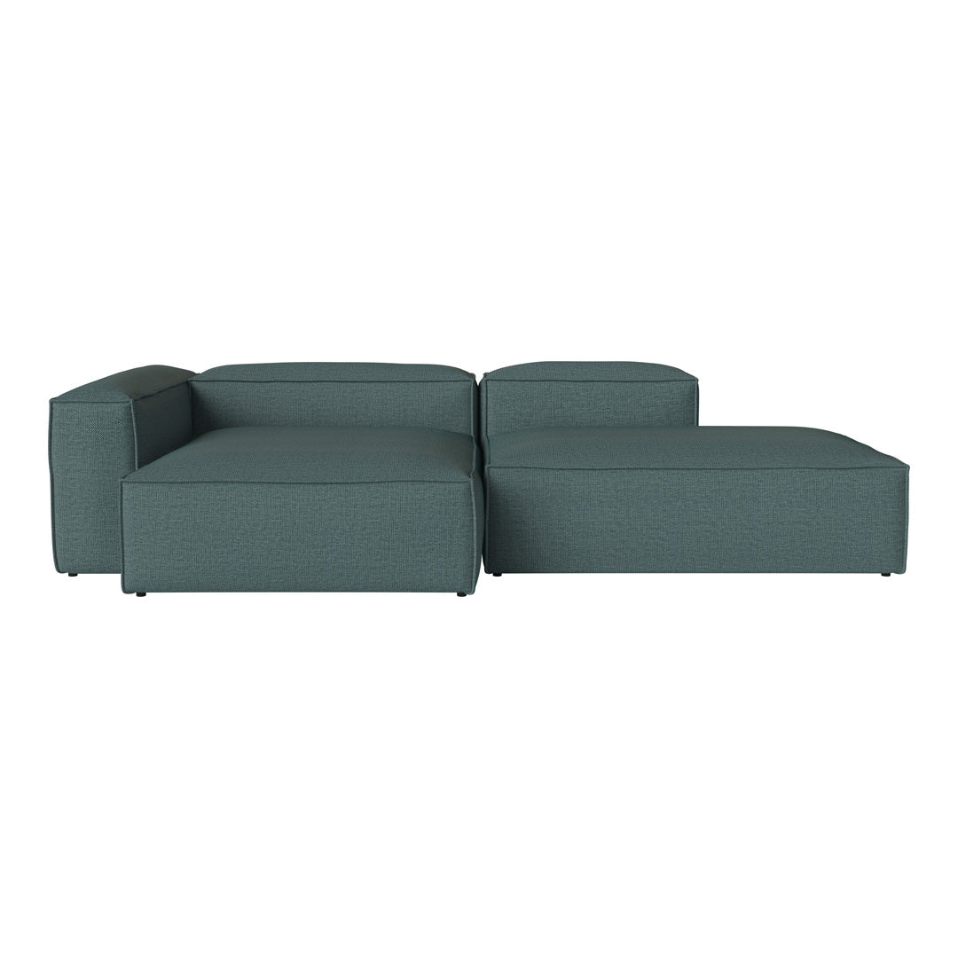 Teal sectional sofa with a smooth, modern design and subtle textured fabric. Ideal for contemporary interiors.