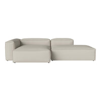 Modern beige sectional sofa with a sleek, minimalist design and smooth, textured upholstery.