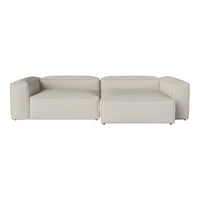 Modern sectional sofa in soft light gray leather with clean lines and minimalistic design, perfect for stylish interiors.