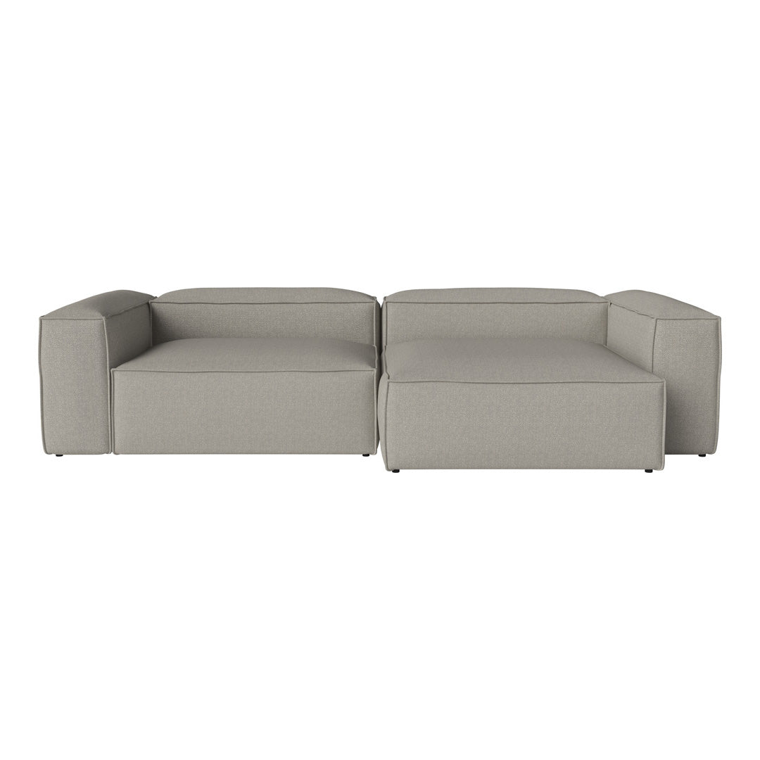 Gray sectional sofa with clean lines and a modern, minimalist design. Perfect for contemporary living spaces.