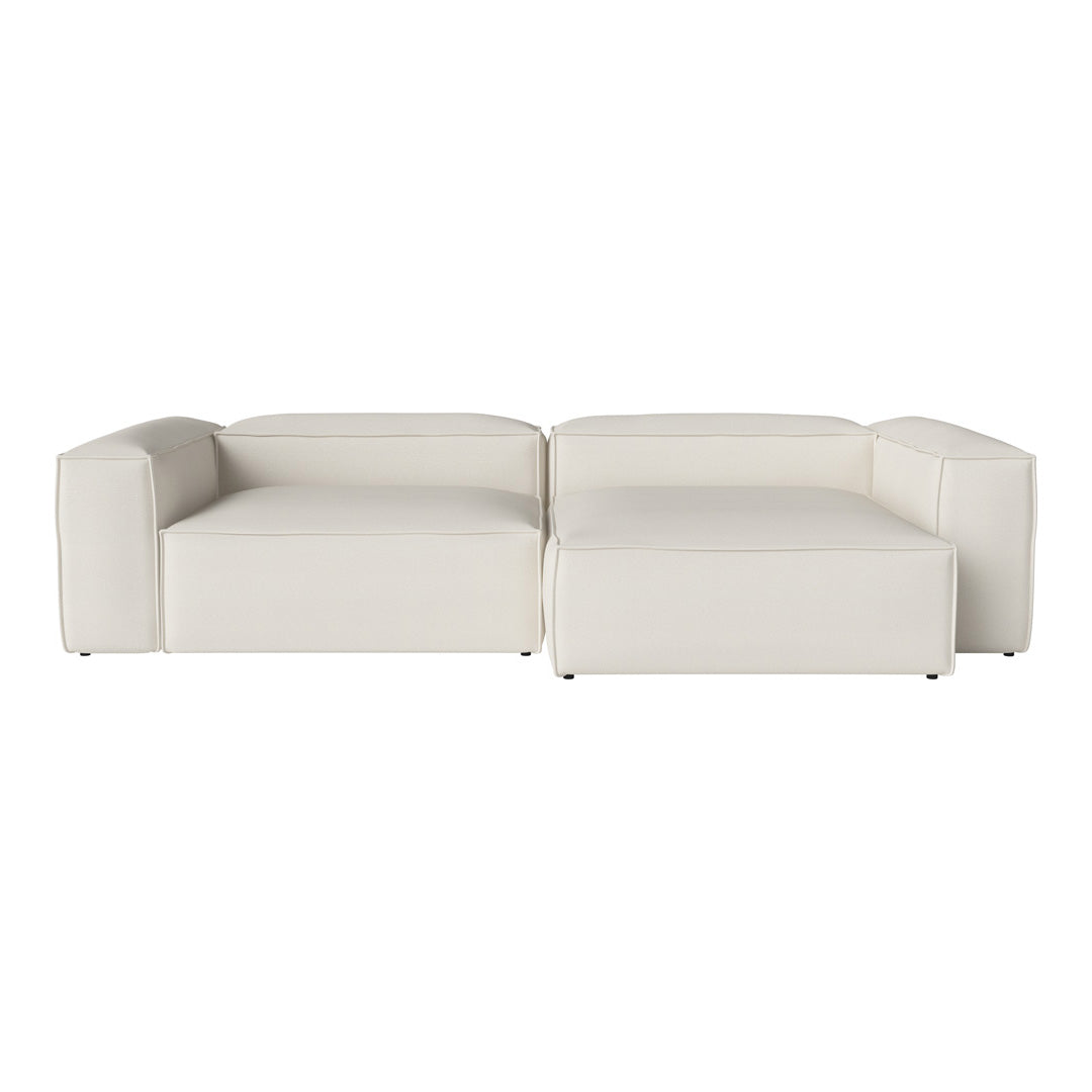 Stylish modular sofa in soft white upholstery with clean lines and contemporary design. Perfect for modern interiors.