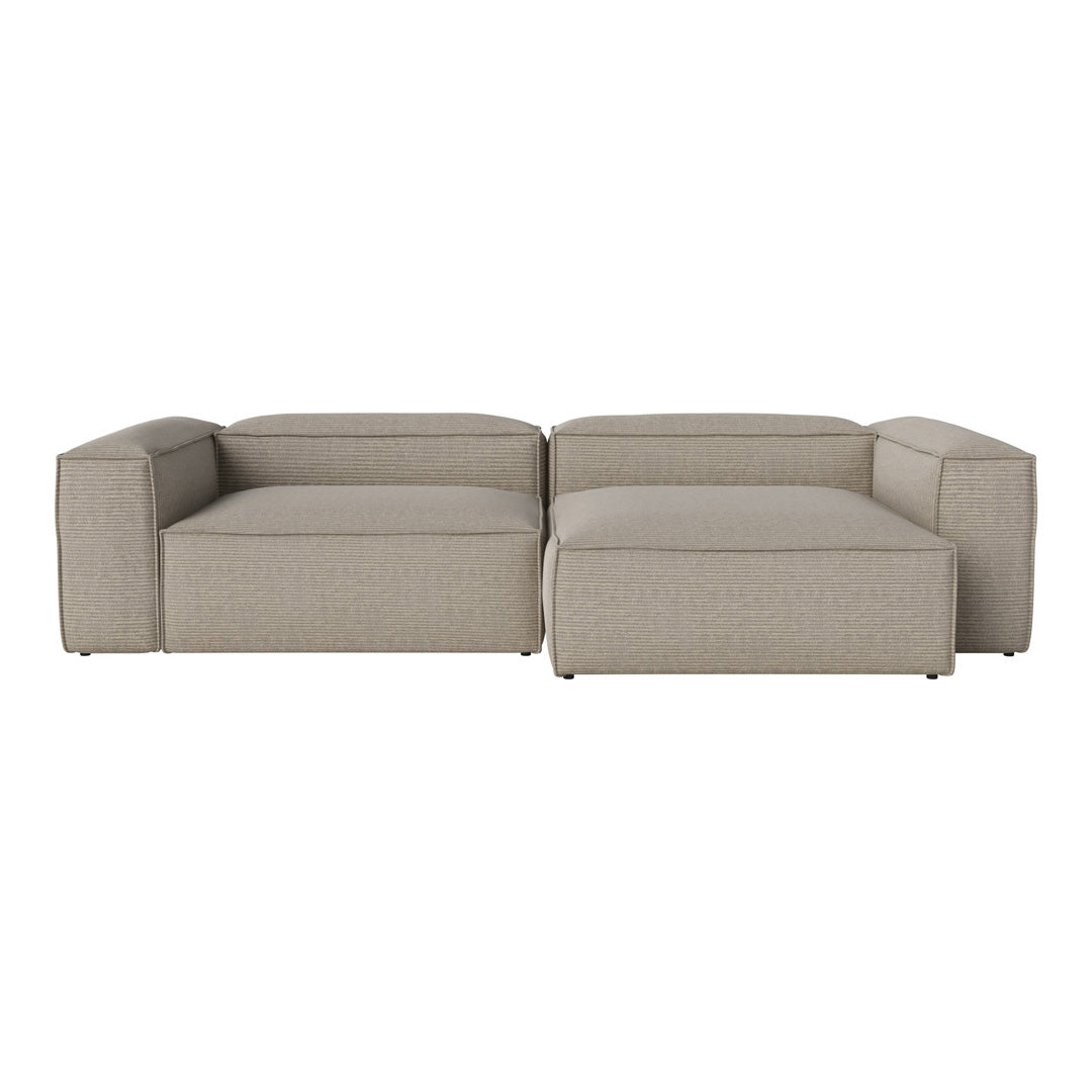 Beige modular sofa with a textured fabric and clean lines, perfect for contemporary living spaces.
