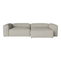 Light gray modular sofa with smooth, minimalist design and no visible patterns, ideal for modern interiors.
