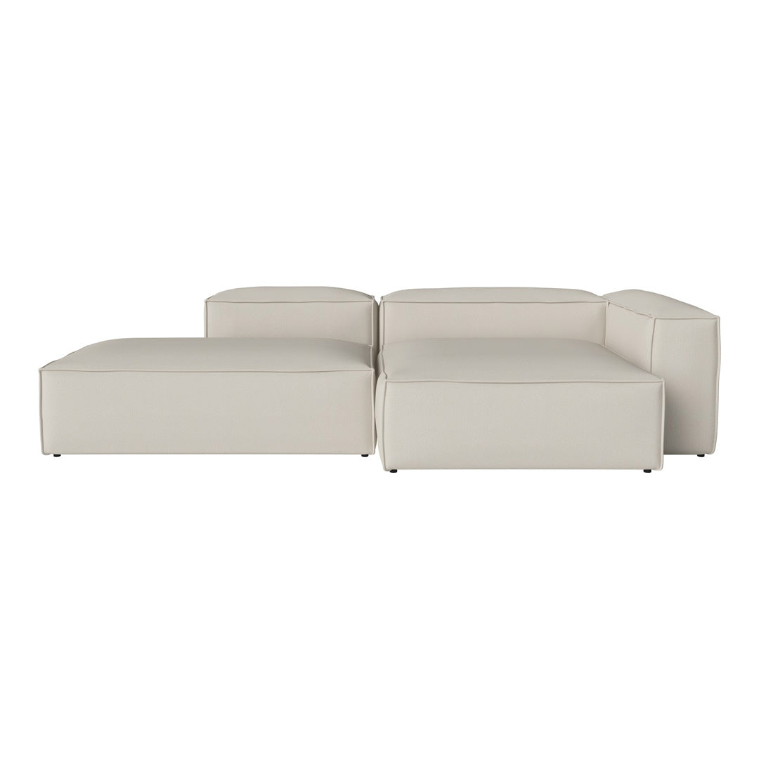 Modern beige sectional sofa with smooth, minimalistic design and no visible patterns. Ideal for contemporary decor.