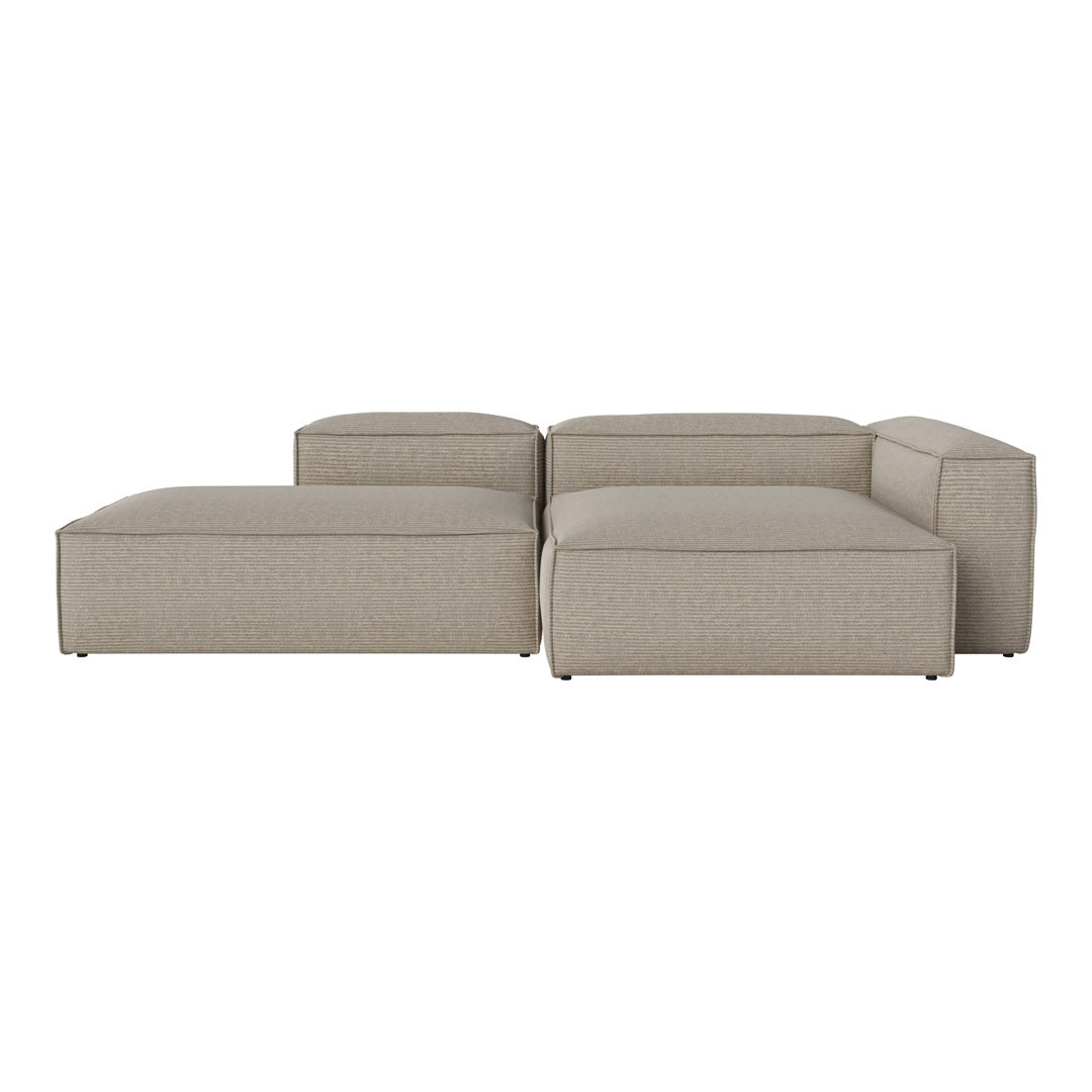 Beige modular sofa with a smooth texture and clean lines, featuring a contemporary design suitable for any living space.