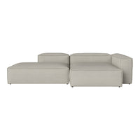 Light gray sectional sofa with a smooth, contemporary design, featuring clean lines and no visible patterns.