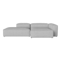 Gray sectional sofa with a modern, minimalist design and smooth fabric texture. Ideal for contemporary living spaces.