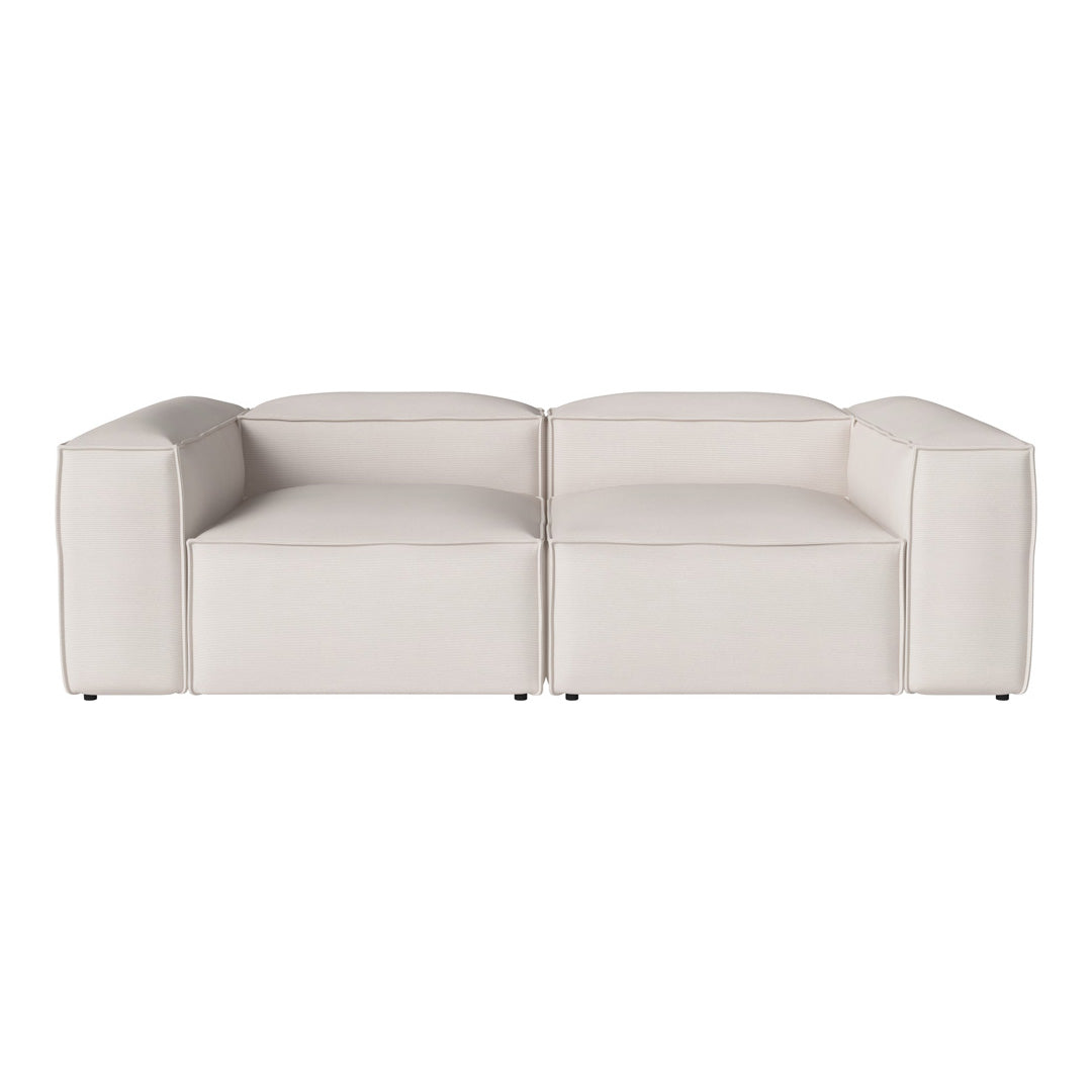 Modern two-tone white sofa with a sleek, minimalist design and smooth, solid surface. Perfect for contemporary decor.