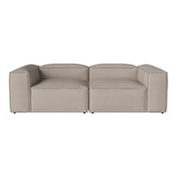 Stylish beige modular sofa with a sleek, contemporary design and smooth, textured fabric. Perfect for modern spaces.