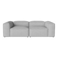 Grey modular couch with a minimalistic design and subtle textured fabric, perfect for modern living spaces.