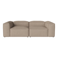 Beige modular sofa with a sleek, minimalist design and textured fabric, perfect for modern living spaces.