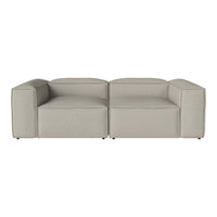 Modern neutral gray sofa with a textured, minimalist design and clean lines, perfect for contemporary interiors.