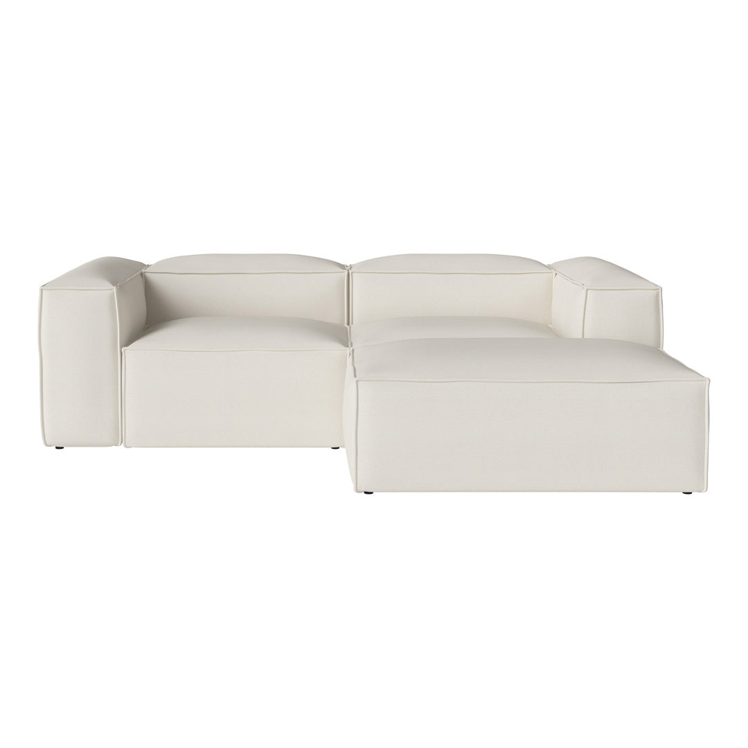 Modern white sectional sofa with clean lines and a minimalist design, perfect for contemporary living spaces.