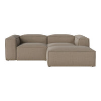 Beige sectional sofa with a textured fabric pattern, featuring clean lines and a modern design.