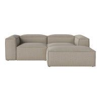 Modern modular sofa in soft beige fabric with a textured, minimalist design. Perfect for contemporary interiors.