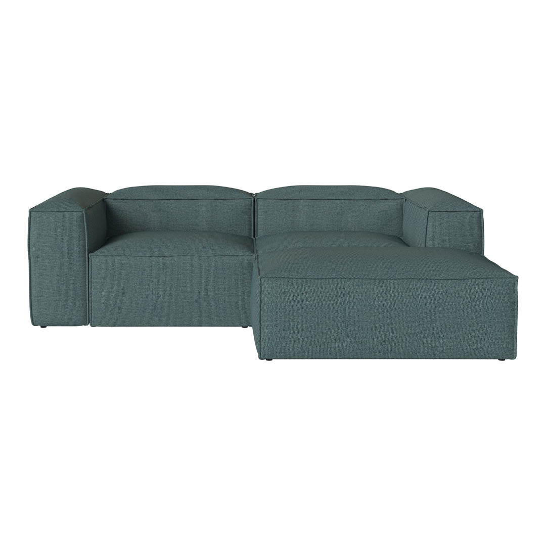 Teal sectional sofa with a minimalist design and textured fabric pattern, perfect for modern living spaces.