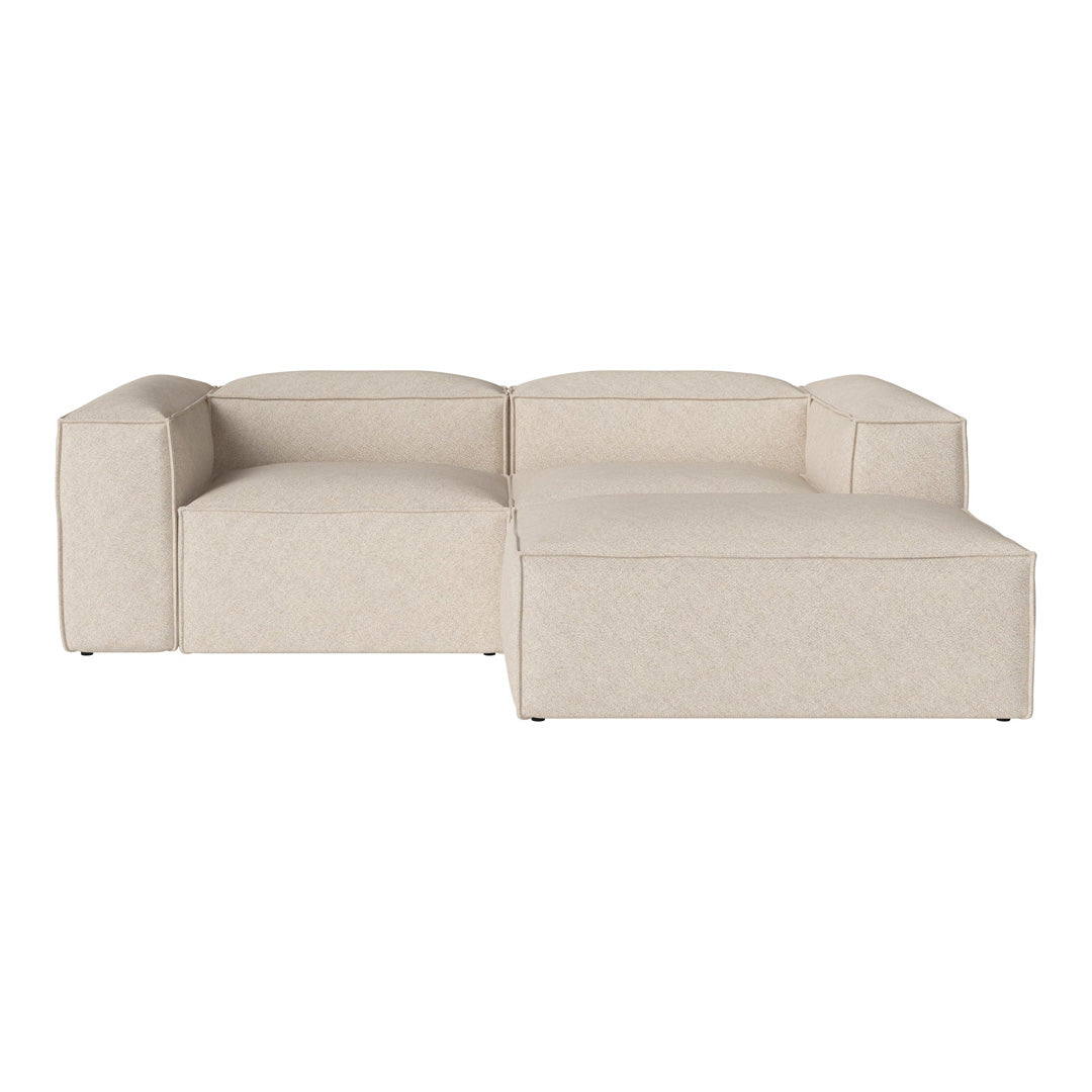 Light beige sectional sofa with a textured pattern, featuring clean lines and a modern design.