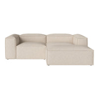 Light beige sectional sofa with a textured pattern, featuring clean lines and a modern design.