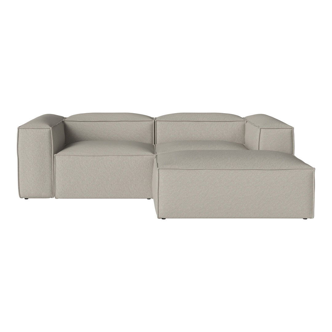 Light gray modern sectional sofa with a minimalist design and smooth fabric texture. Ideal for contemporary living spaces.
