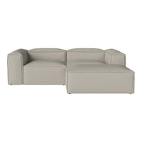 Light gray modern sectional sofa with a minimalist design and smooth fabric texture. Ideal for contemporary living spaces.