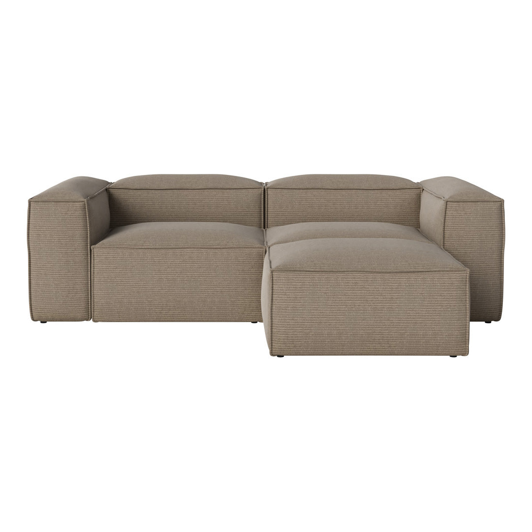 "Light brown modular sofa with a smooth, textured fabric and minimalist design."