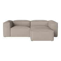 Beige modular couch with a sleek, minimalist design and smooth, soft upholstery. Perfect for modern living spaces.